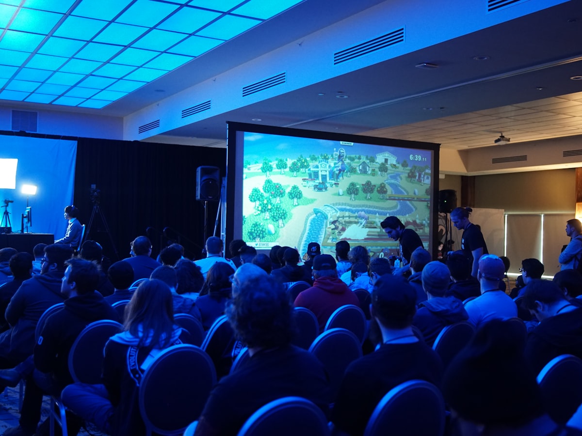 Attendees seated at a business conference session